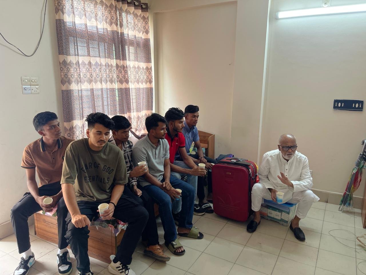 Mr. MD Akbar Babul talking to cricket players before the match